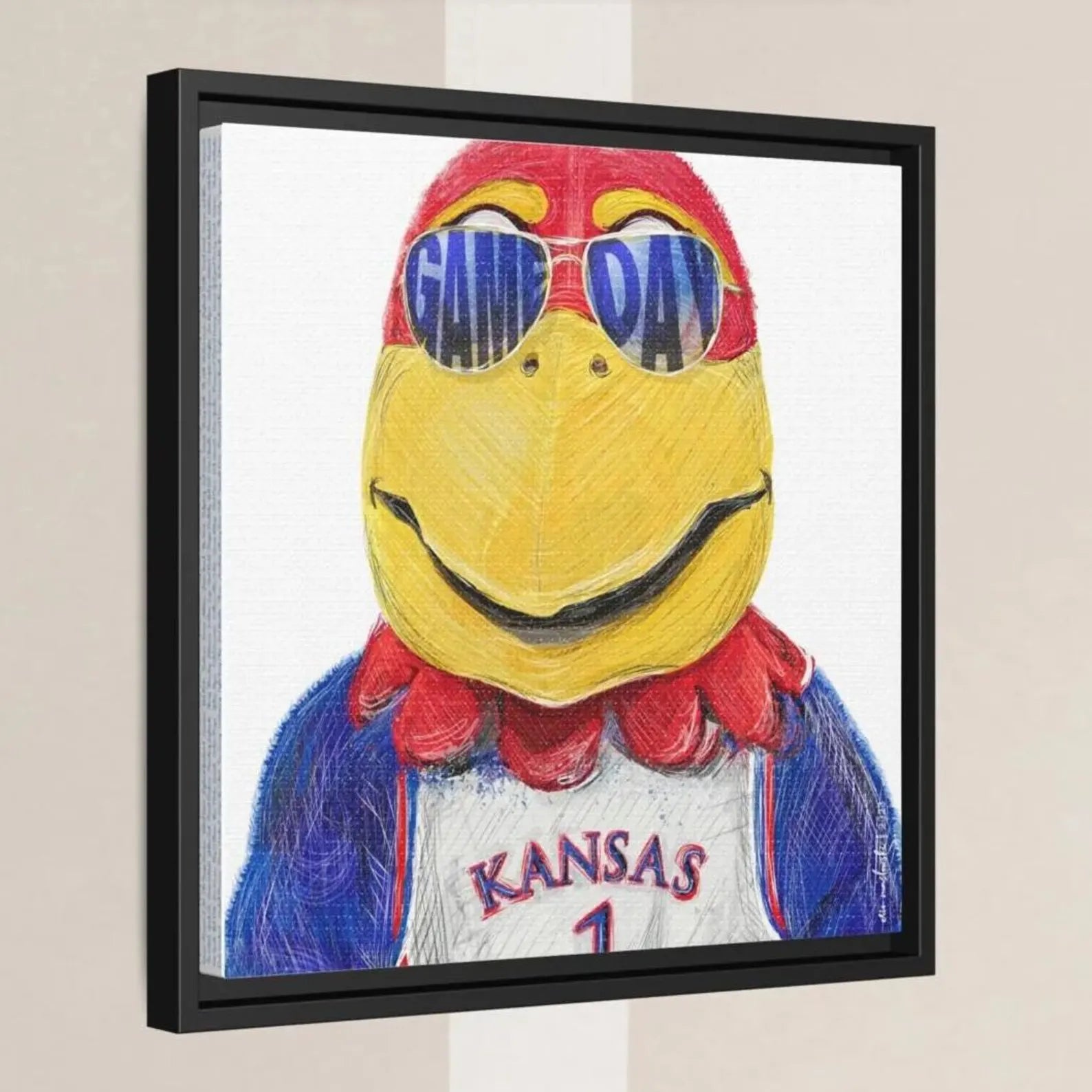 A framed illustration of a colorful bird mascot wearing sunglasses and a Kansas City Royals jersey, with the word "GAME DAY" written on the sunglasses.