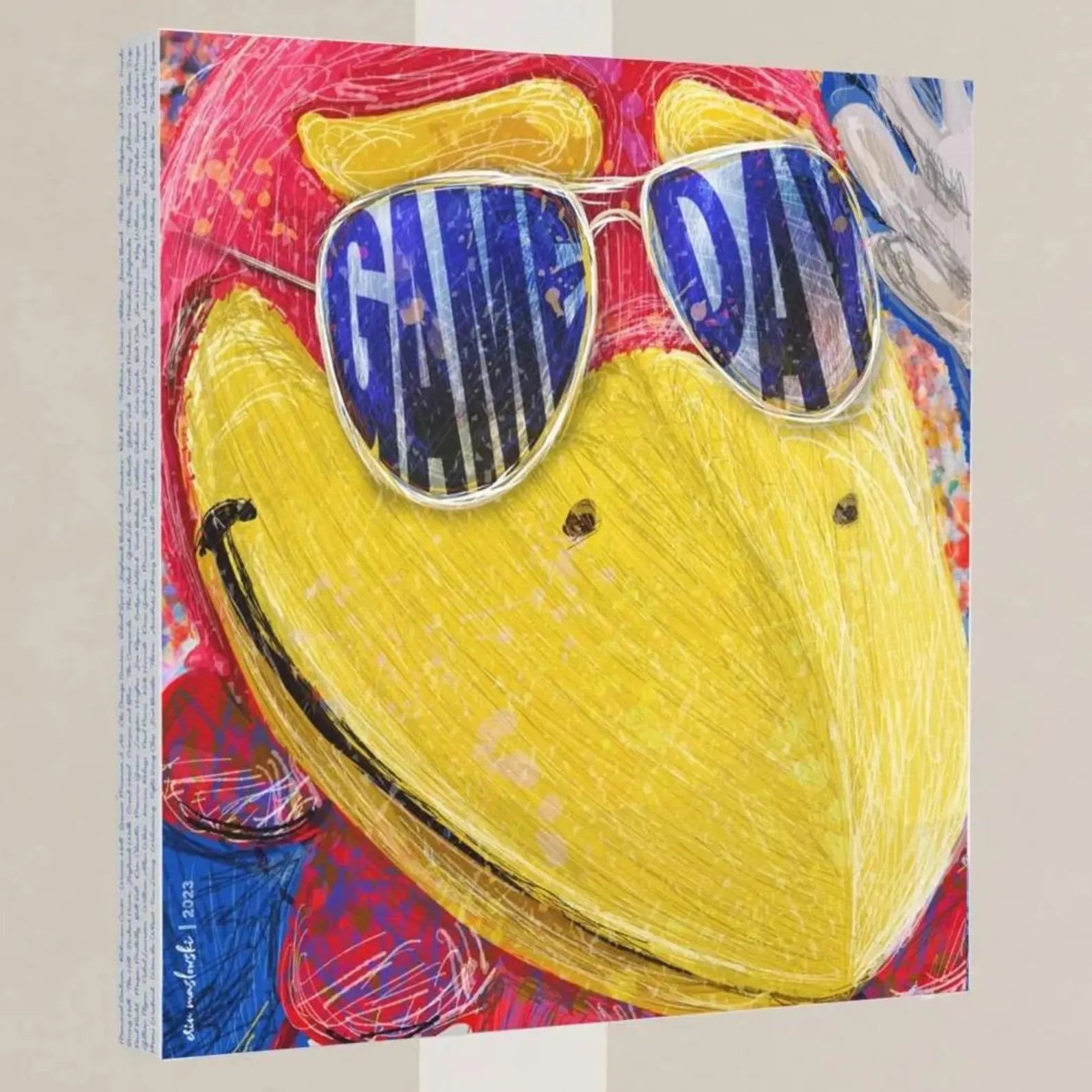 The image is a vibrant and colorful painting featuring a large yellow bird wearing sunglasses with the word "GAME DAY" written on them.