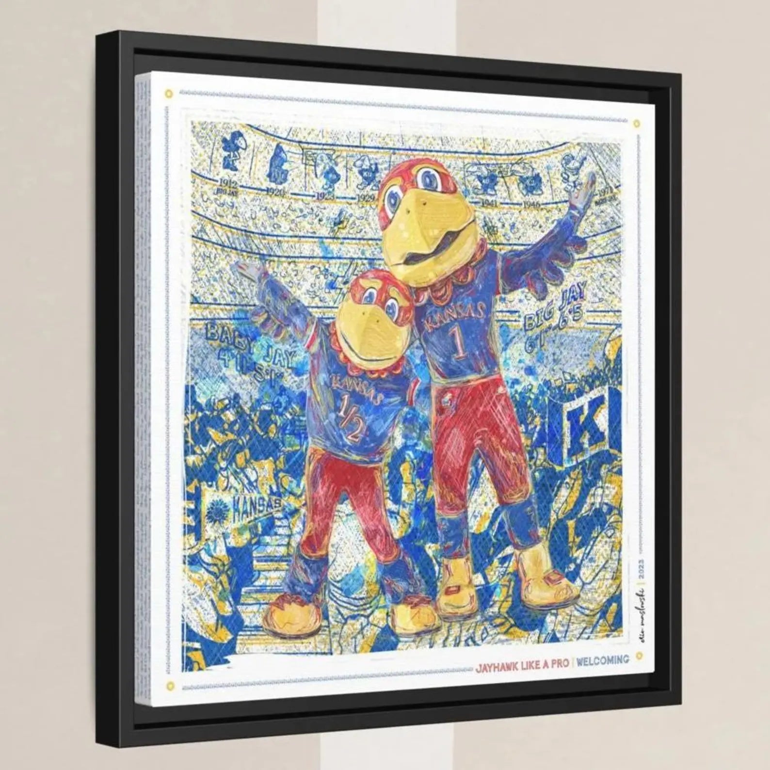 The image is a framed artwork depicting two large, colorful birds, likely representing Kansas City Royals, in a stadium setting.