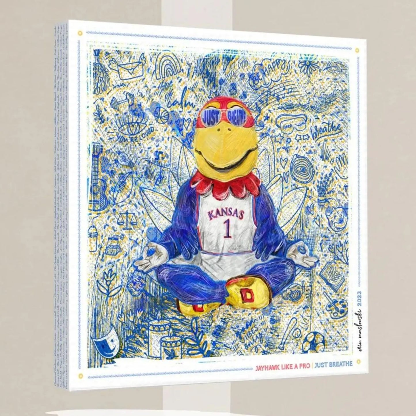 A colorful illustration of a mascot character wearing a Kansas University jersey, sitting in a meditative pose with a serene expression.