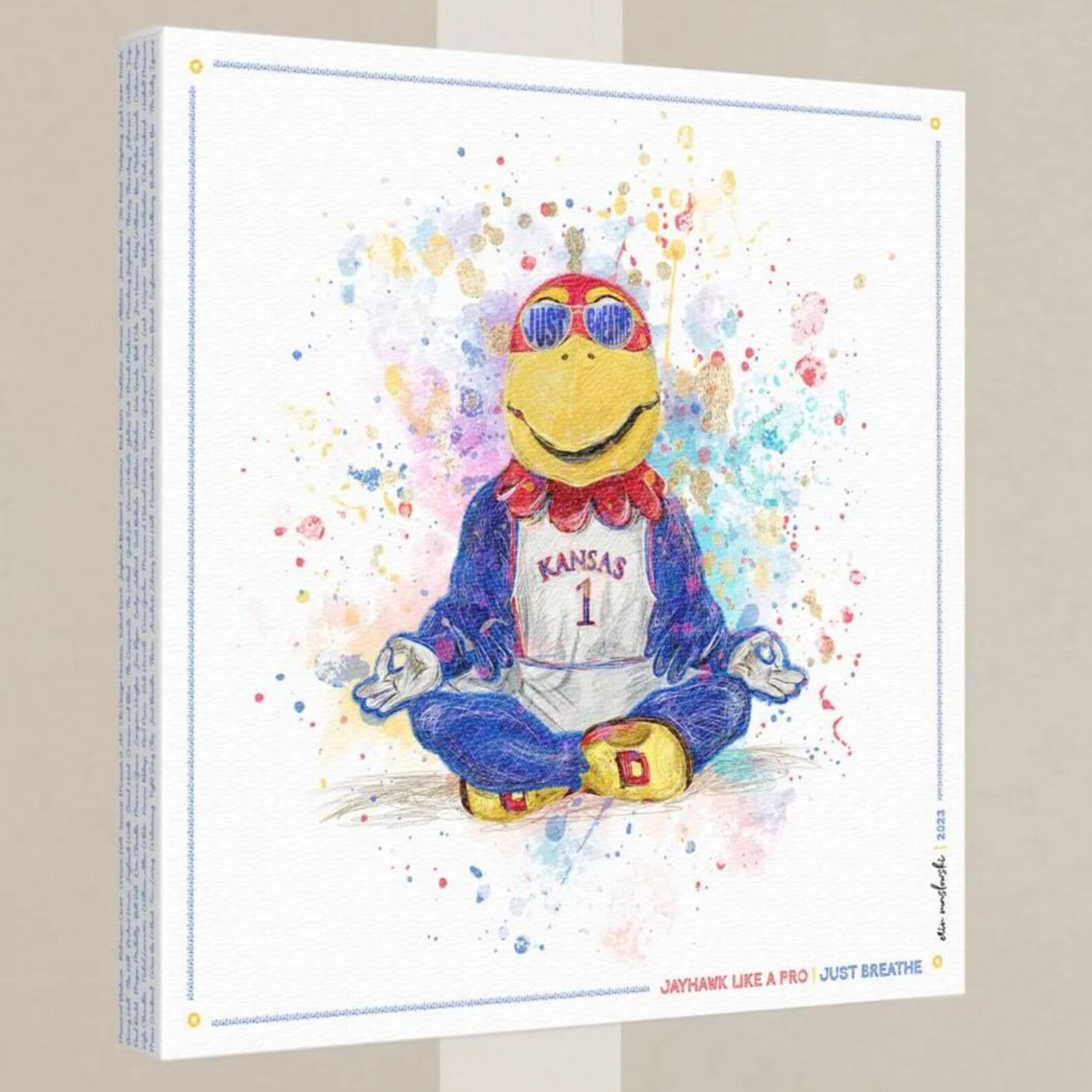 A colorful illustration of a bird mascot wearing a Kansas jersey and sunglasses, sitting in a meditative pose with its hands in a "V" shape.