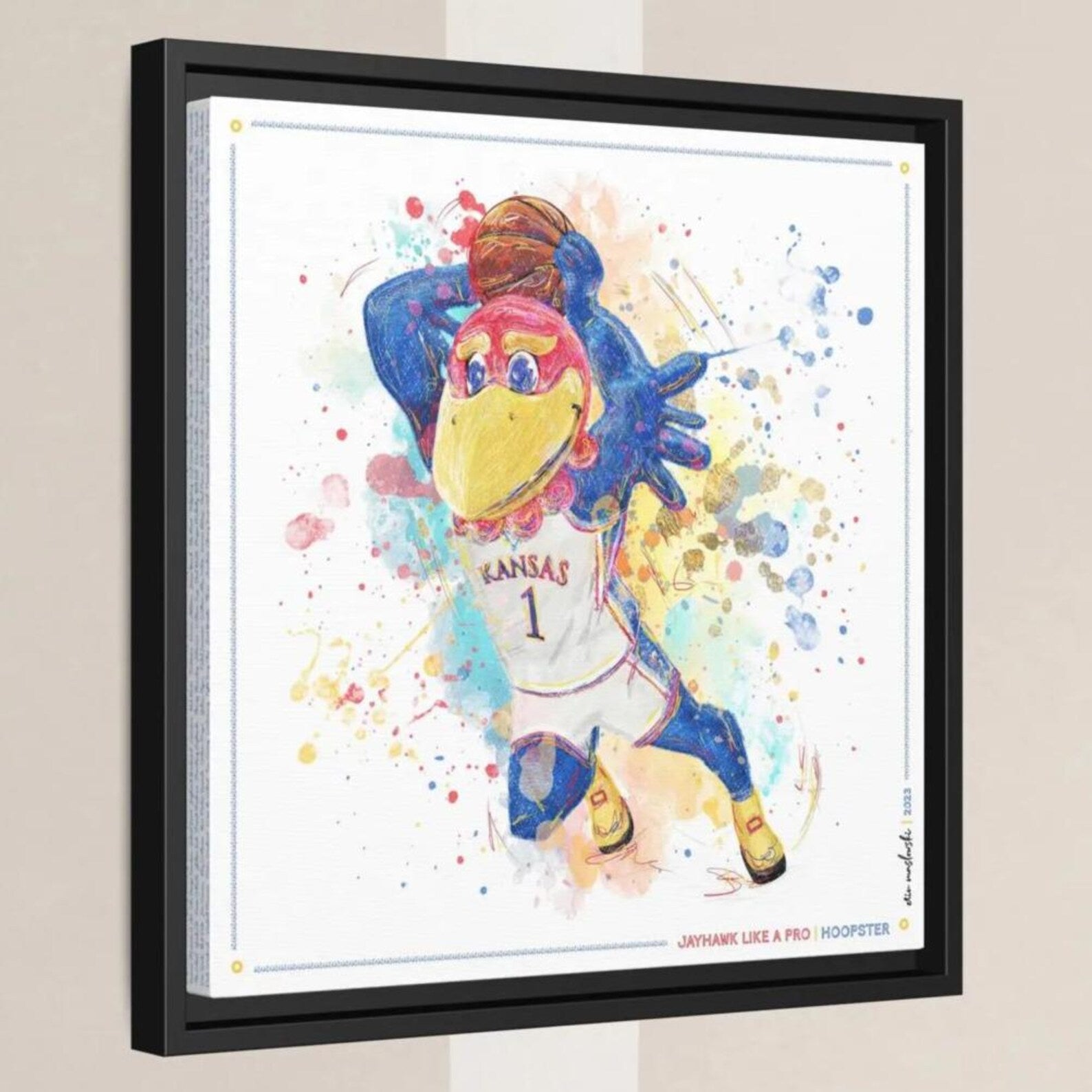 A colorful, abstract painting depicting a bird character wearing a Kansas basketball jersey, with splashes of color surrounding it.