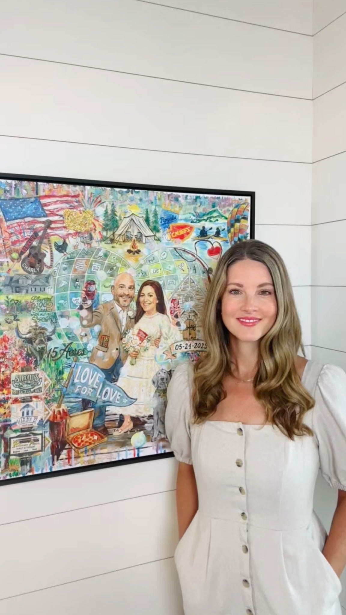 Erin Maslowski beside her finished custom couple’s heart artwork.