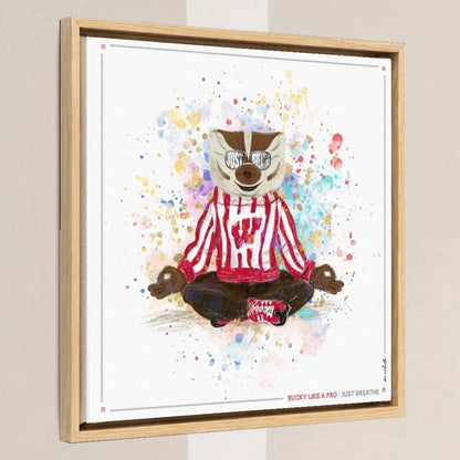 UW Bucky Badger Just Breathe Art: Wisconsin Splatter Paint Canvas Print in a light oak float frame